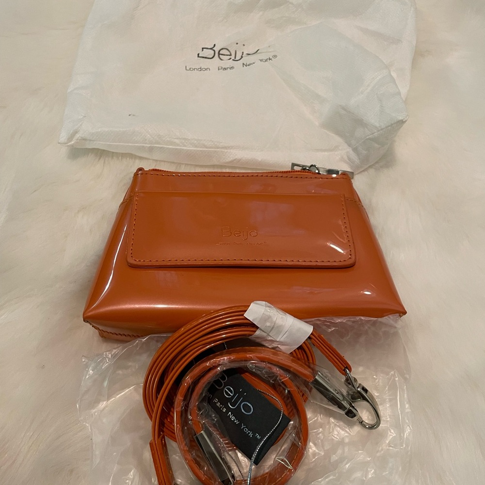 Rusty orange Beijo purse. NWT